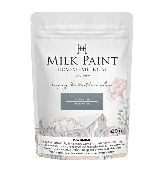 Pack of Steel Blue Homestead House Milk Paint with floral design and text on a white background