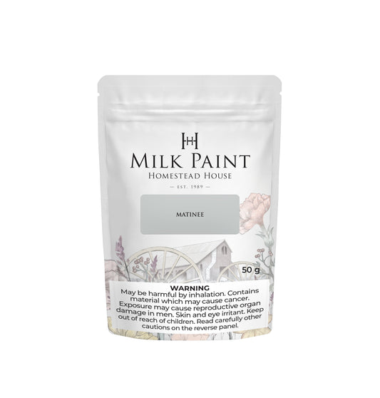 Matinee Milk paint packaging with 'Homestead House' branding on a white background