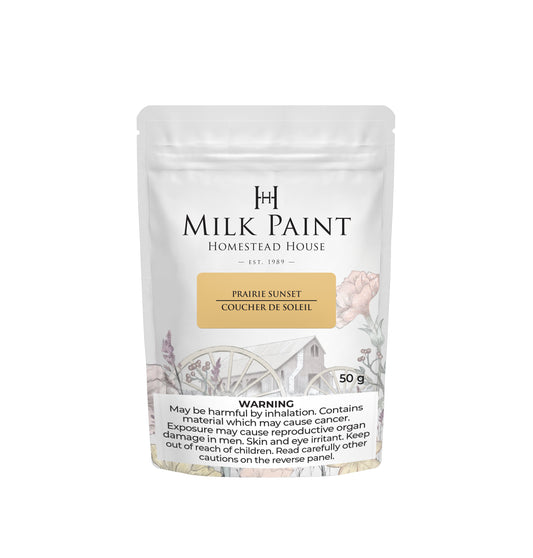 Prairie Sunset Homestead House Milk Paint packaging with product name and warning label on a white background