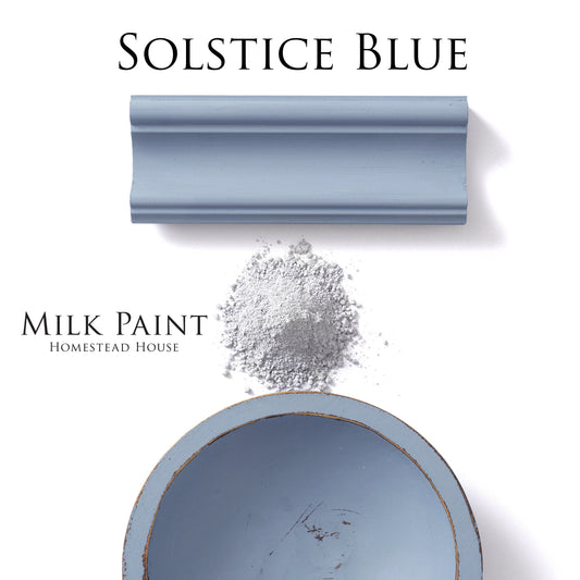 Solstice Blue Homestead House Milk Paint flat lay with chippy bowl, milk paint powder and painted trim