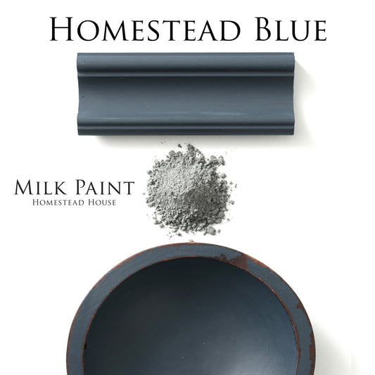 Homestead Blue milk paint flat lay with a powder sample and painted bowl and trim on a white background