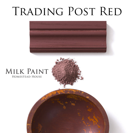 Trading Post Red homestead House Milk Paint Flatlay showing swatches on moulding, chippy bowl and milk paint powder