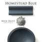 Homestead Blue milk paint flat lay with a powder sample and painted bowl and trim on a white background