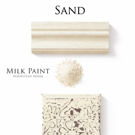 Homestead House Milk Paint Sand flat lay with decorative engraved tile, milk paint powder and smooth painted trim