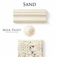 Homestead House Milk Paint Sand flat lay with decorative engraved tile, milk paint powder and smooth painted trim