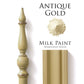 Antique Gold Homestead House Milk Paint flatlay with milk paint powder, painted trim and distressed vintage decorative spindle