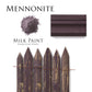 Mennonite Milk Paint Homestead House with a sample of paint, color swatch, and wooden fence.